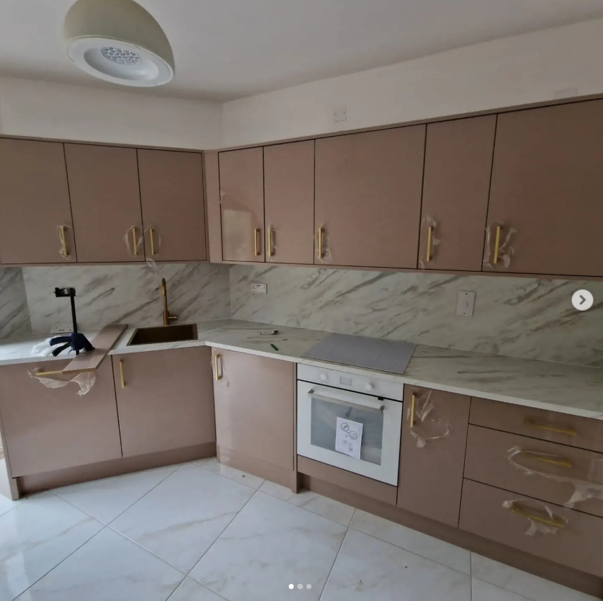Bespoke mauve and marble kitchen renovation